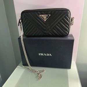 COPY - Dual pocket crossbody clutch with silver chain.